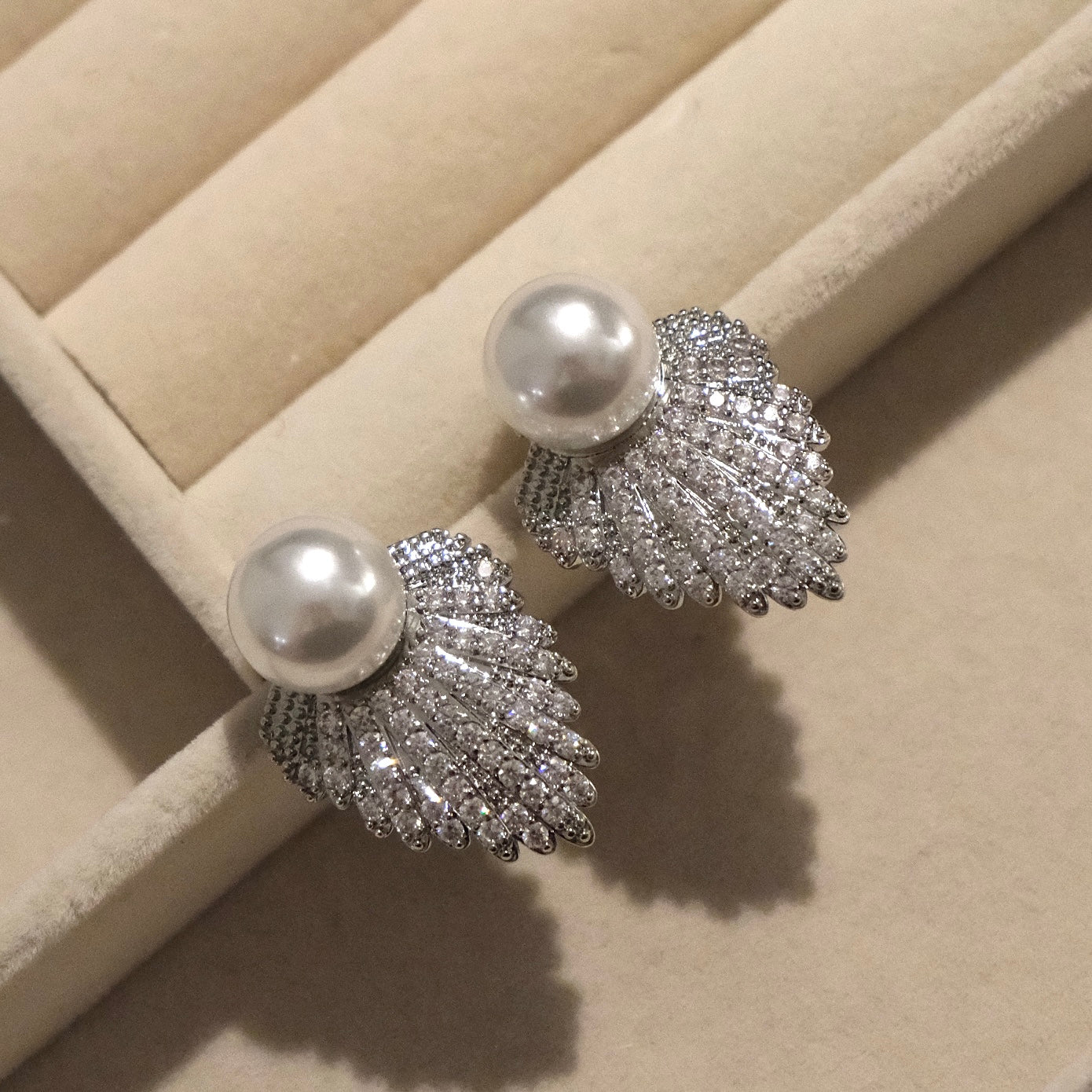 Elegant Pearl and Silver Leaf Stud Earrings