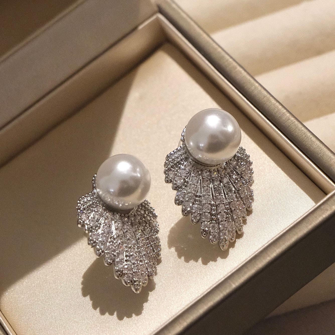 Elegant Pearl and Silver Leaf Stud Earrings